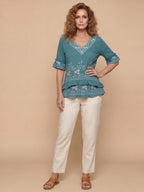 Women’s Embroidered V-Neck Ruffle Hem Blouse