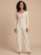 Elegant off-the-shoulder women’s cardigan with gold buttons