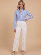 Women’s checked blouse with ruffled details
