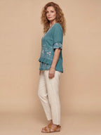 Women’s Embroidered V-Neck Ruffle Hem Blouse