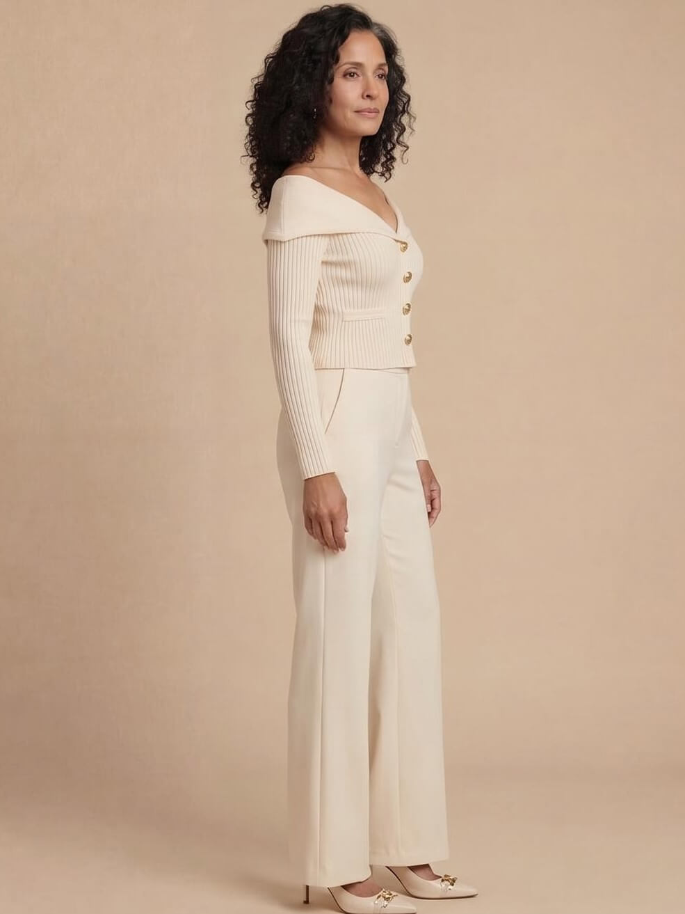 Elegant off-the-shoulder women’s cardigan with gold buttons