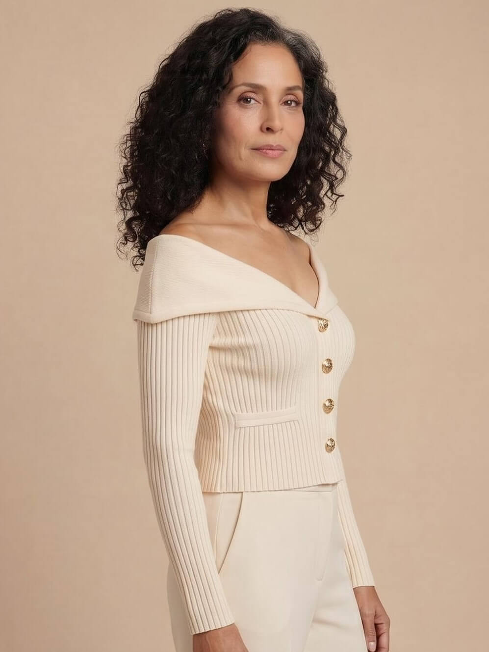 Elegant off-the-shoulder women’s cardigan with gold buttons