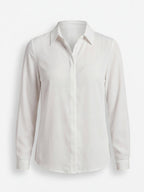 Elegant women's blouse with a classic collar